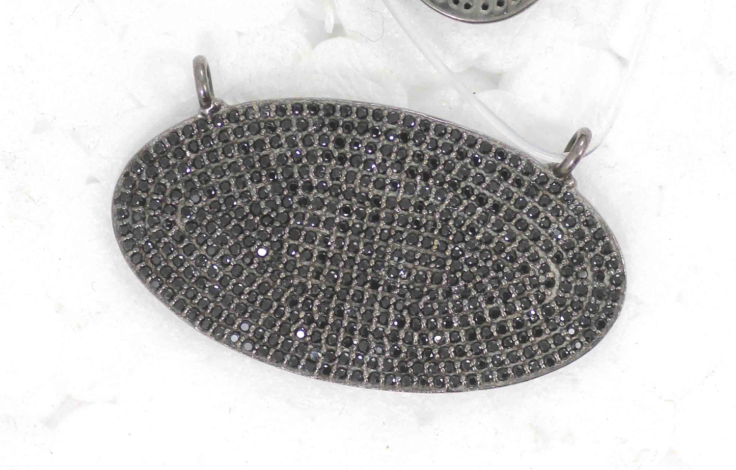 Oval Shape Black Spinal Charm