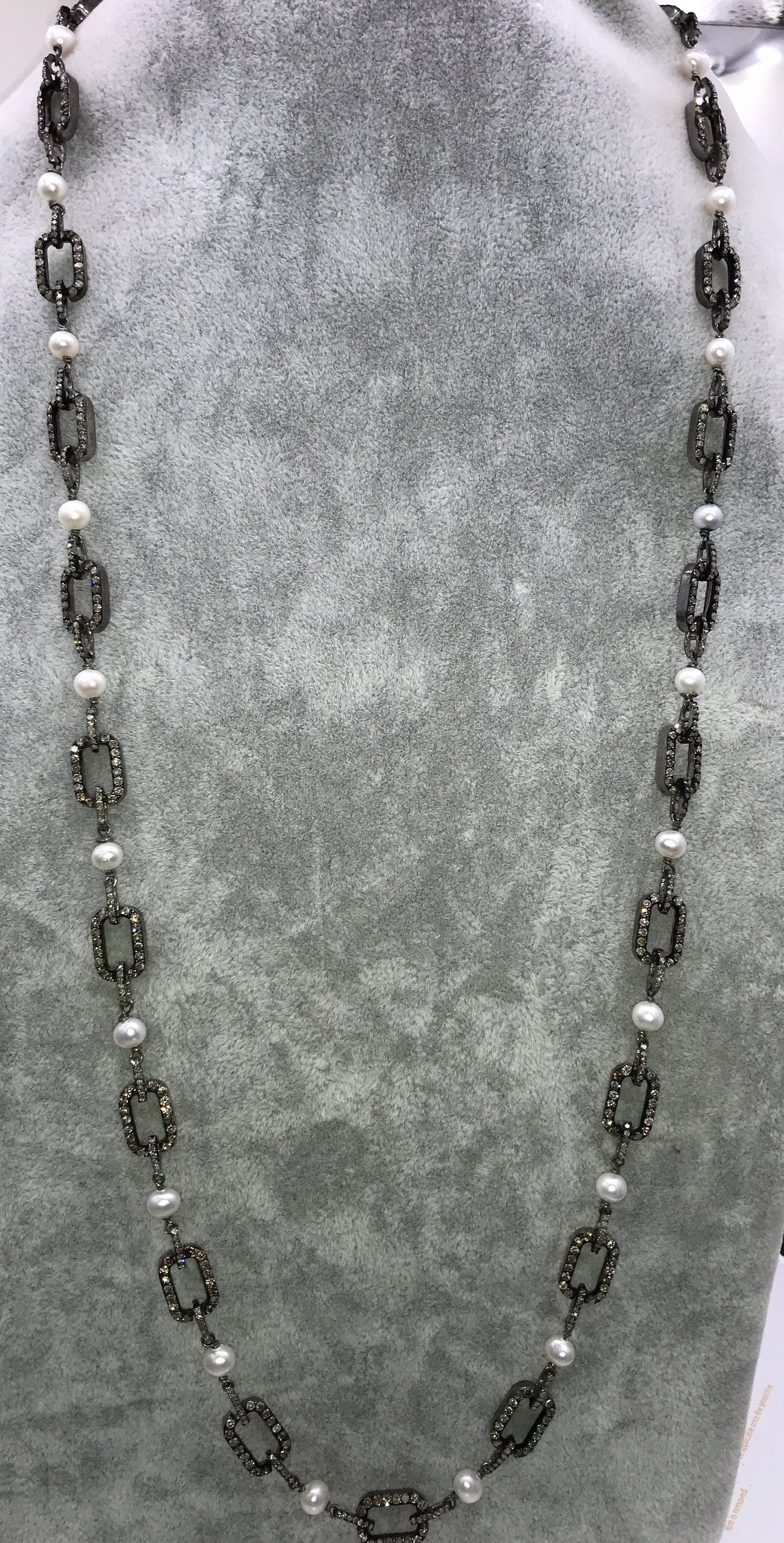 Pearl with diamond link chain