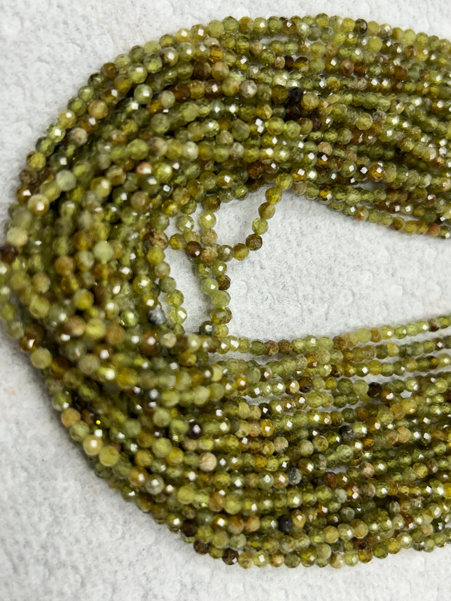 Garnet, Grossular Garnet Multi Faceted Round 3mm
