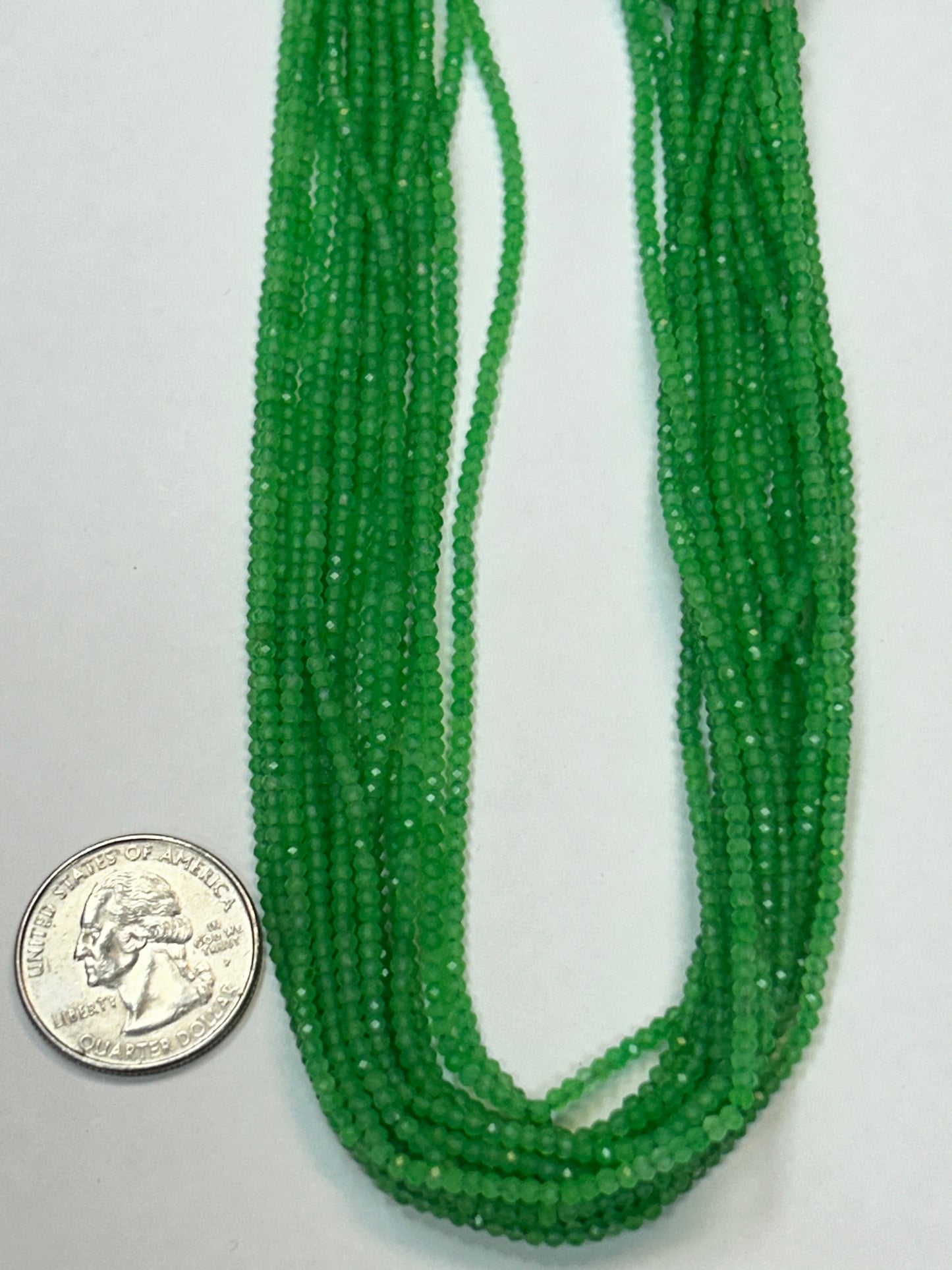 GREEN STONE ROUND FACETED 2-3mm