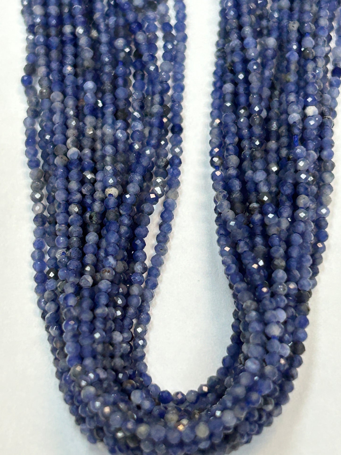 IOLITE ROUND FACETED 2-3mm