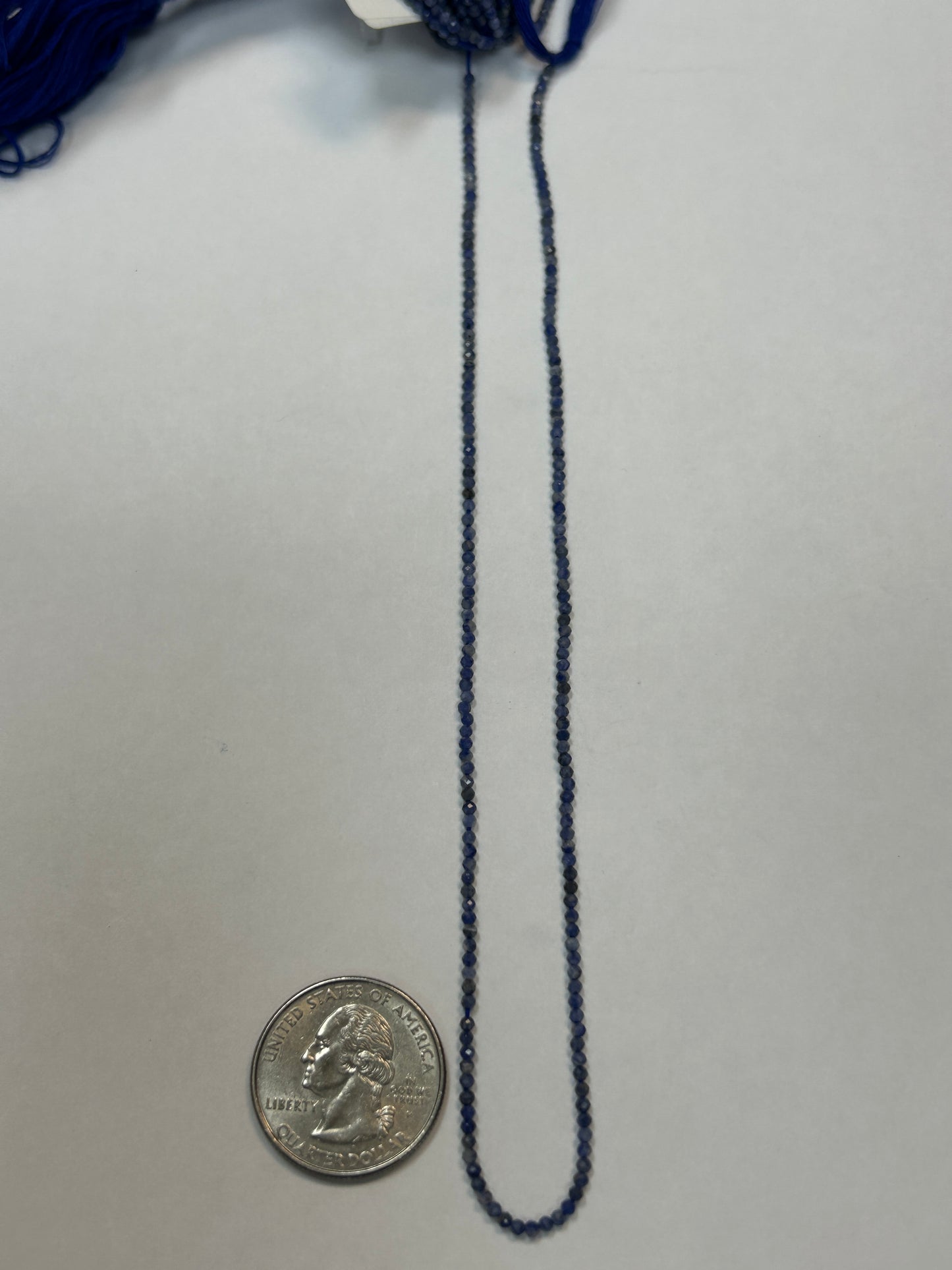 IOLITE ROUND FACETED 2-3mm