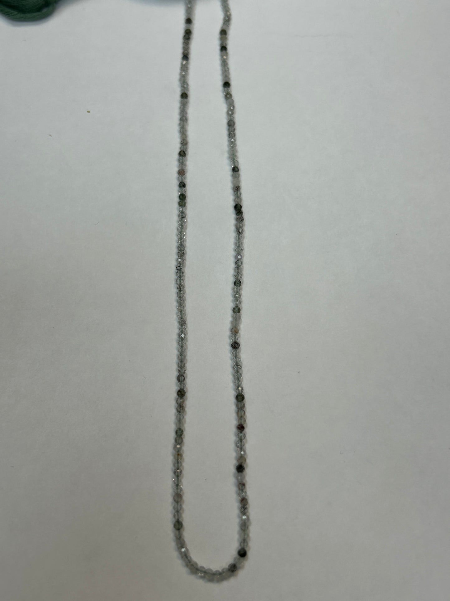 GREEN ROUTILATED QUARTZ ROUND FACETED 2-3mm