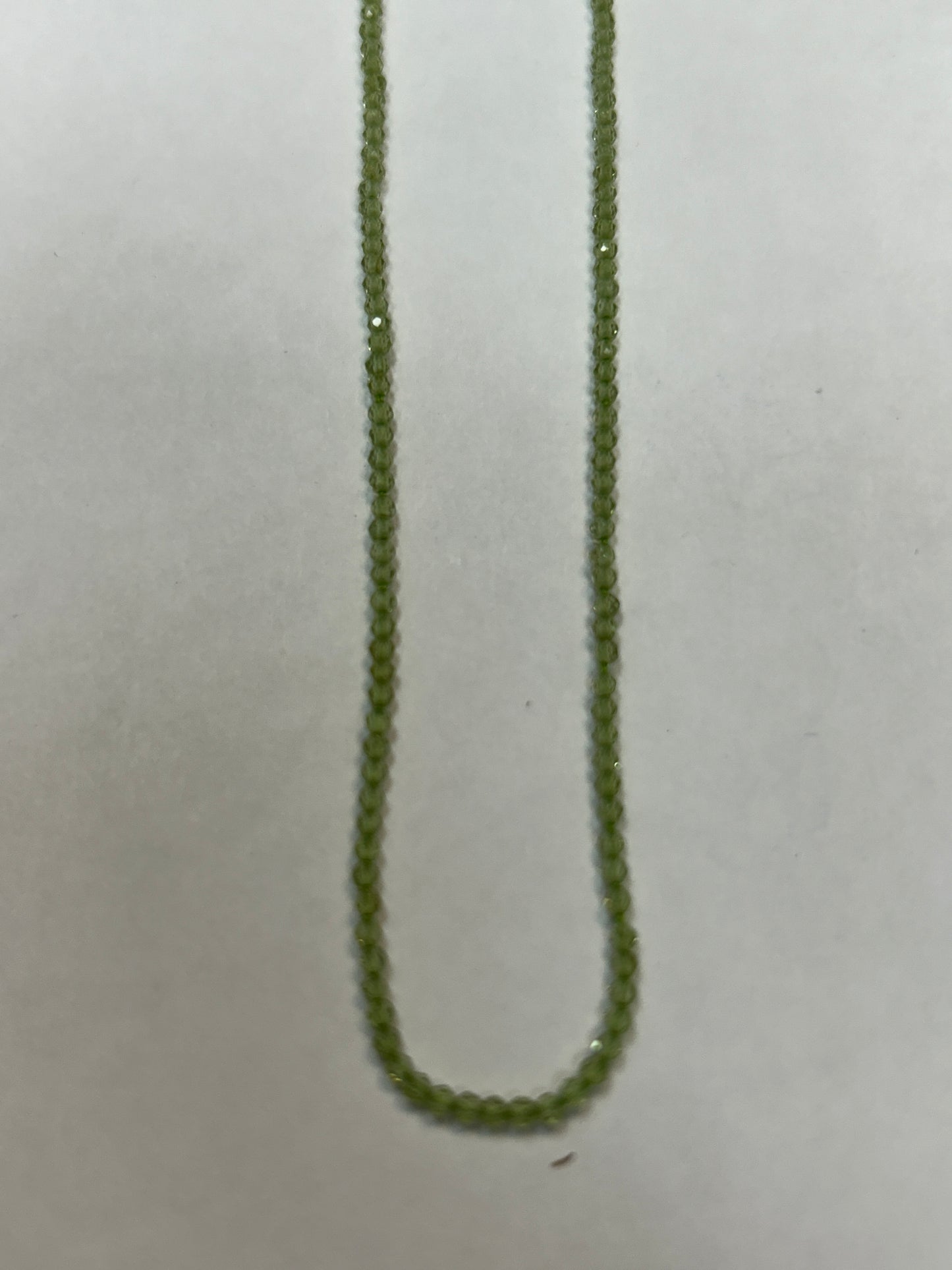 PERIDOT ROUND FACETED 2-3mm