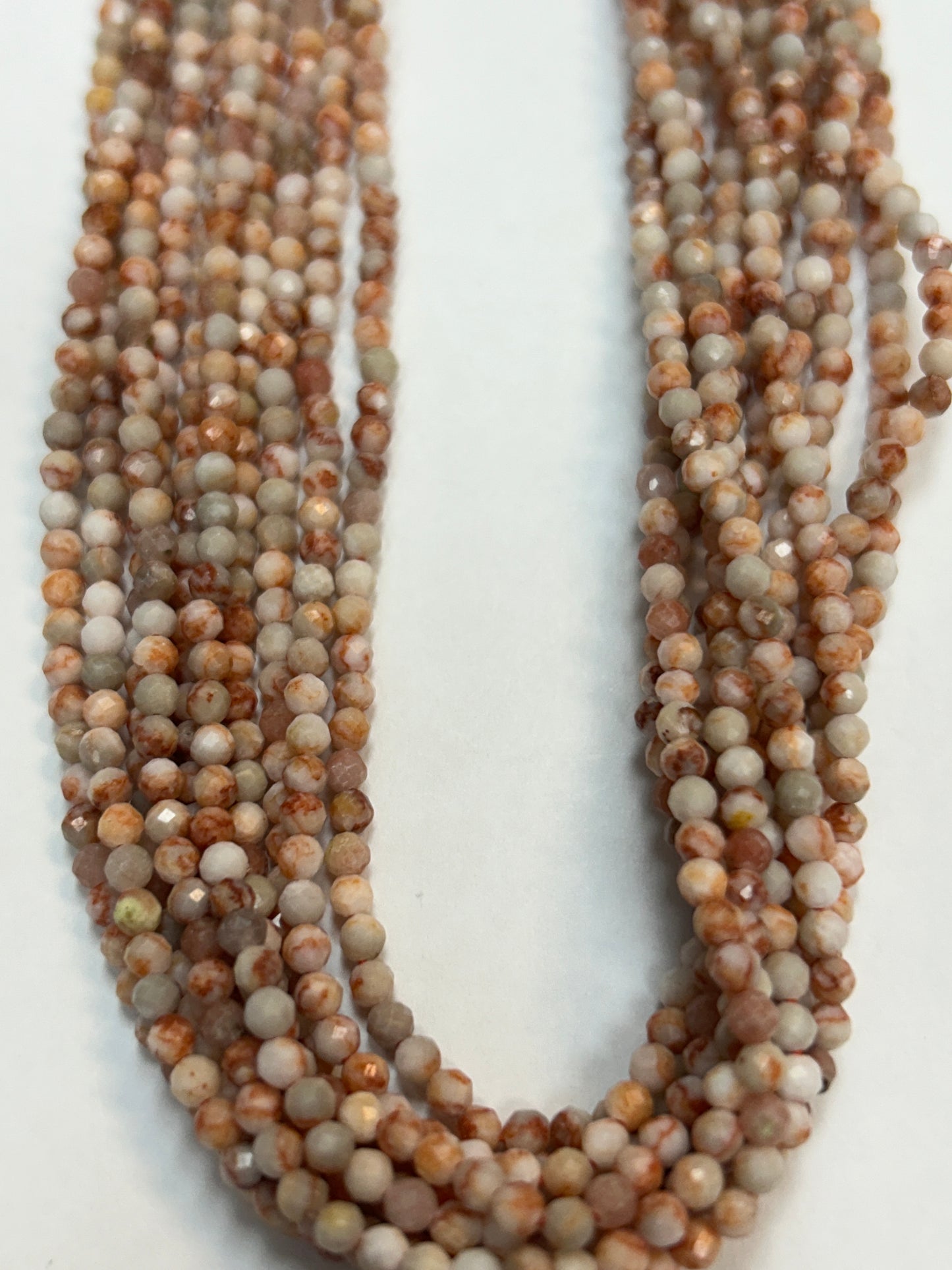 Howlite, Turquoise Howlite Reconstituted Round Faceted 3-4mm