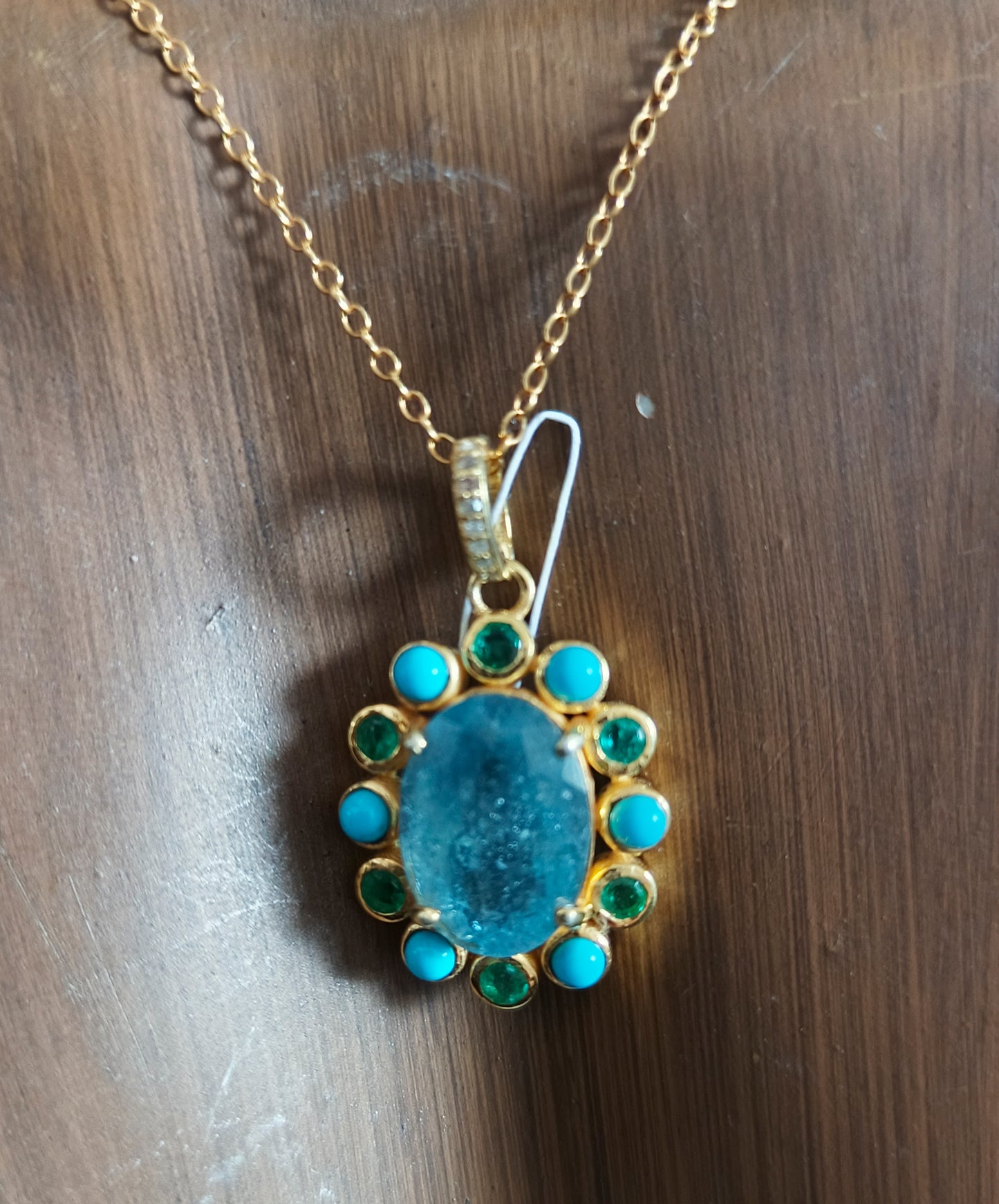 Oval Aquamarine stone pendant in 925 silver with pave diamonds, turquoise and emerald accents, 25x20 mm.