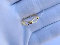14k Solid Gold Diamond Rings.