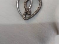 Heart shaped sterling silver pendant with Diamond