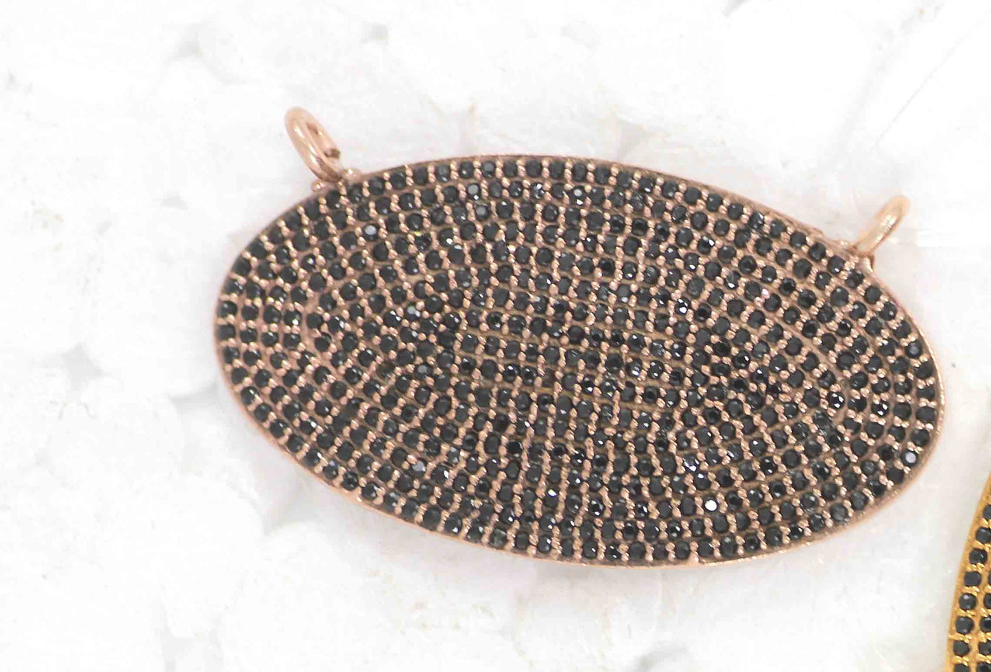 Oval Shape Black Spinal Charm
