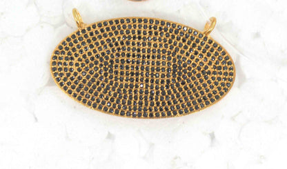 Oval Shape Black Spinal Charm