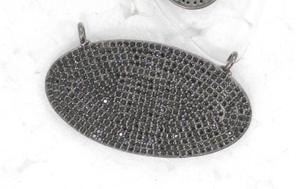 Oval Shape Black Spinal Charm