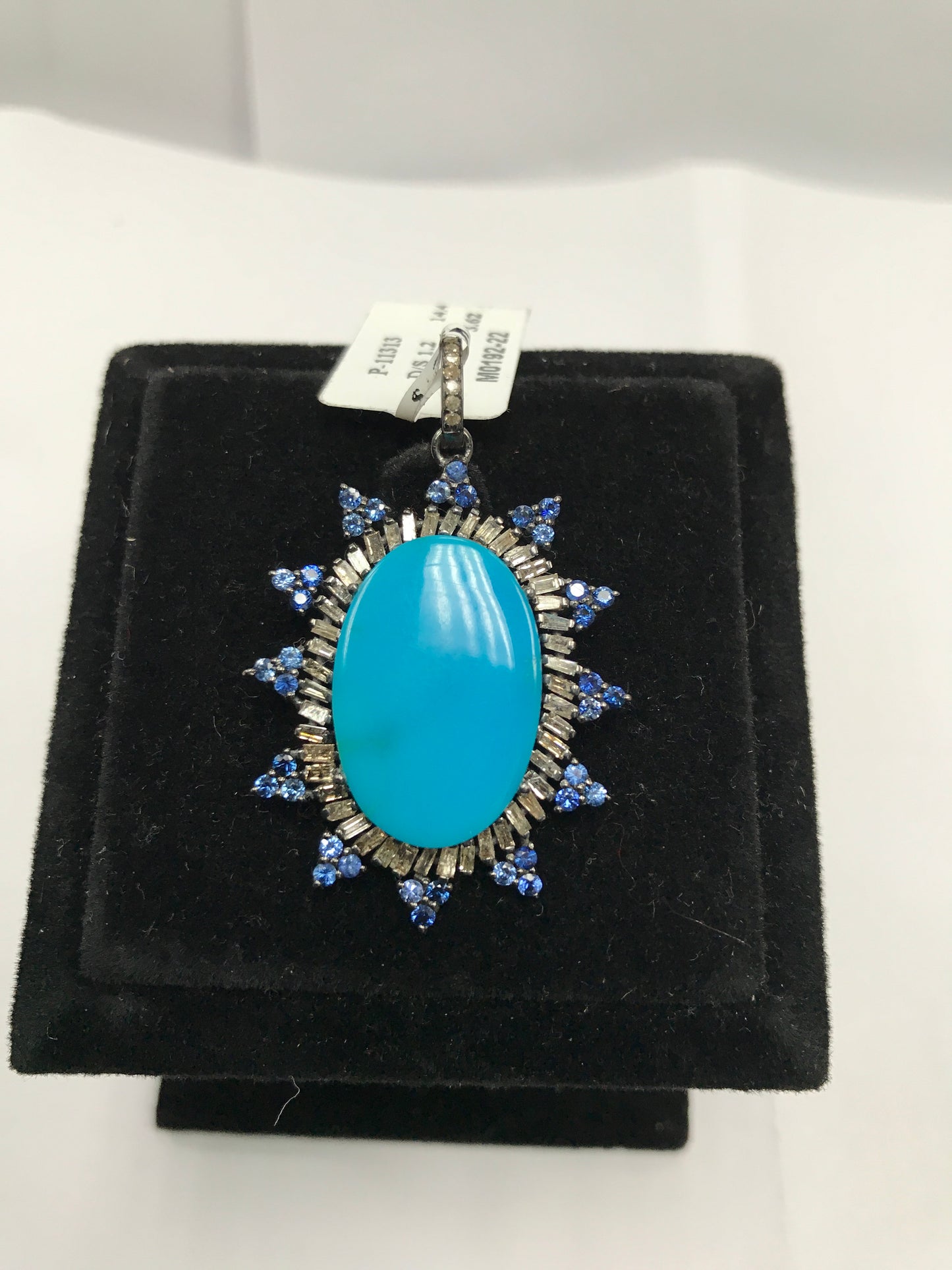 Oval spike blue pendant