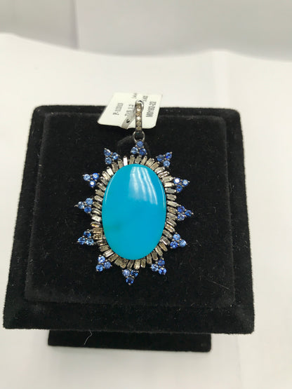 Oval spike blue pendant