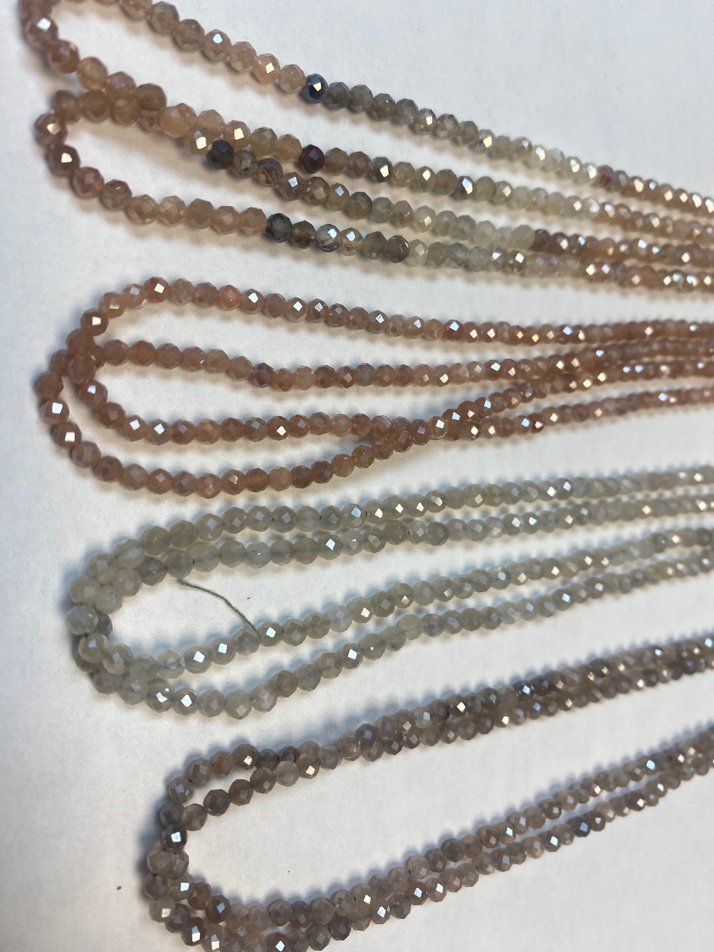 MOONSTONE COATED BEADS ROUND FACETED 3-4MM