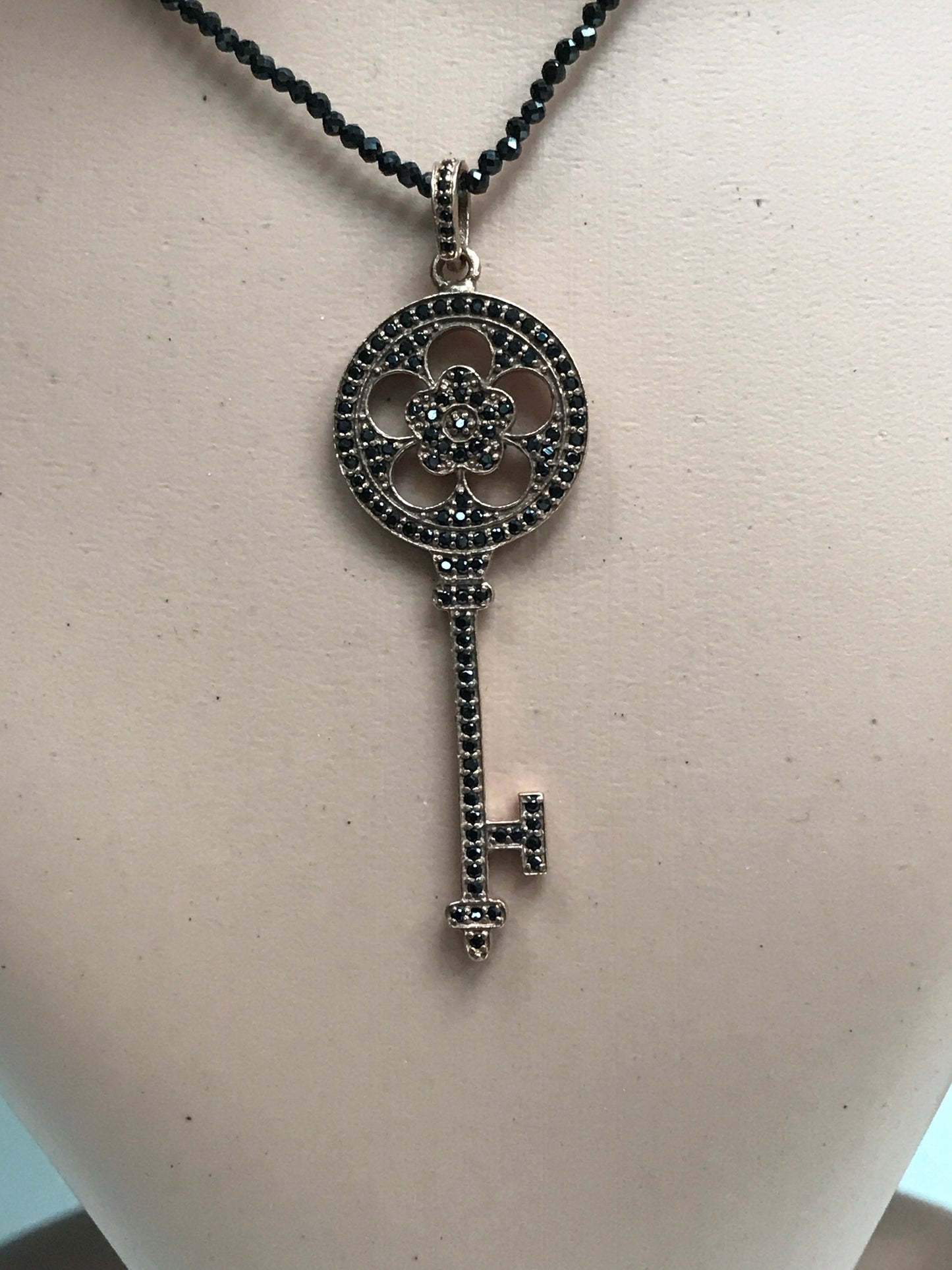 Key Shape Black Spinel Charm
