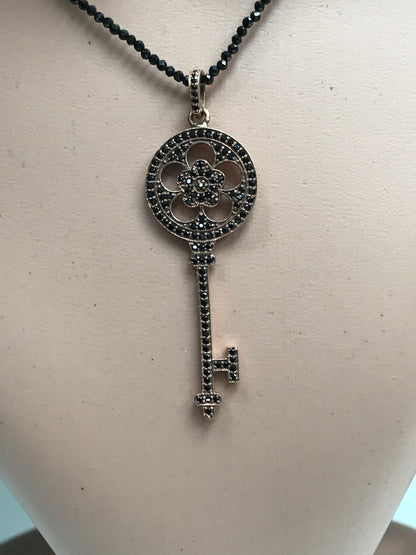 Key Shape Black Spinel Charm