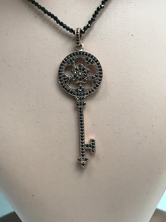 Key Shape Black Spinel Charm