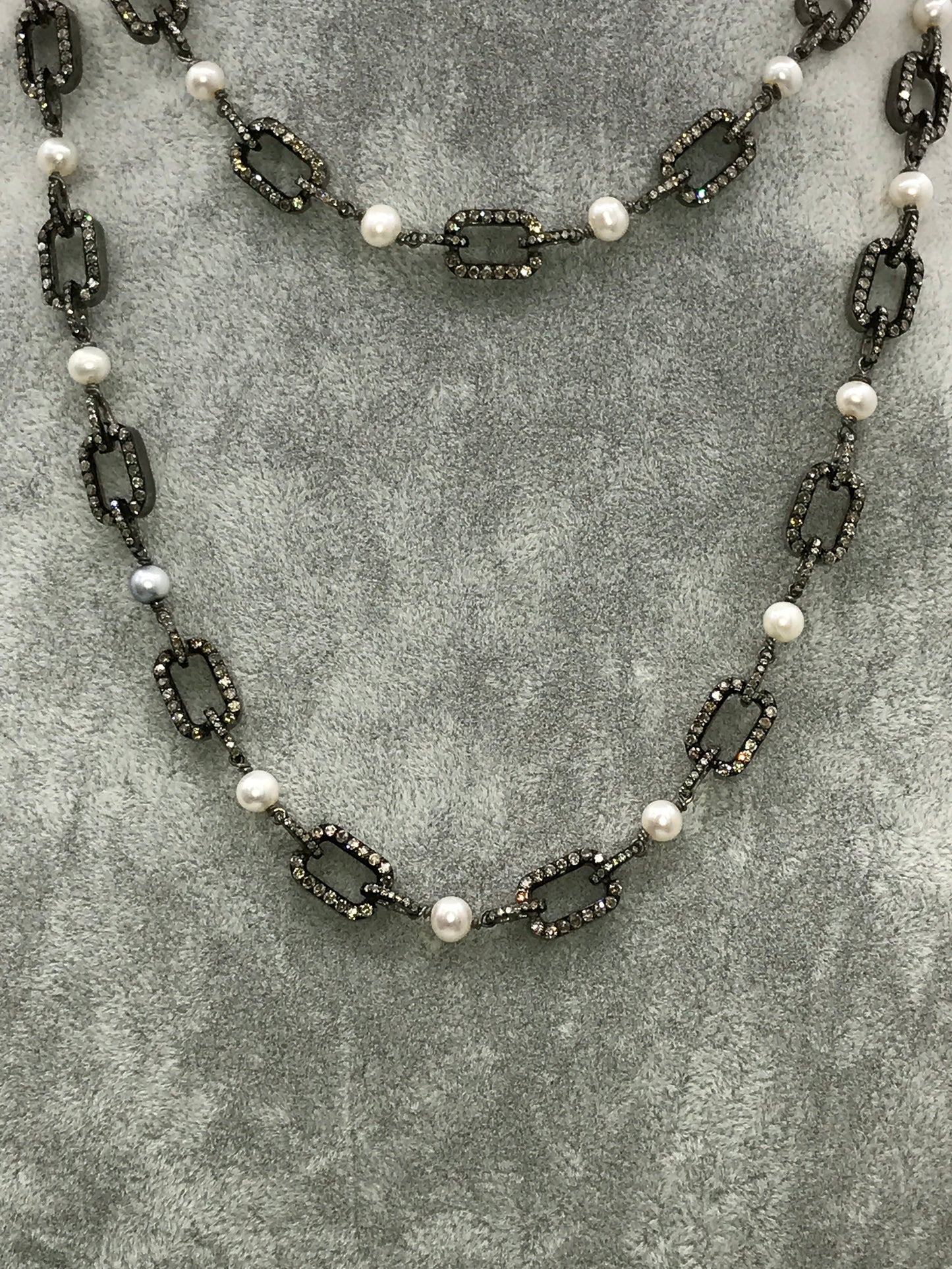Pearl with diamond link chain