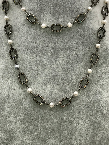 Pearl with diamond link chain