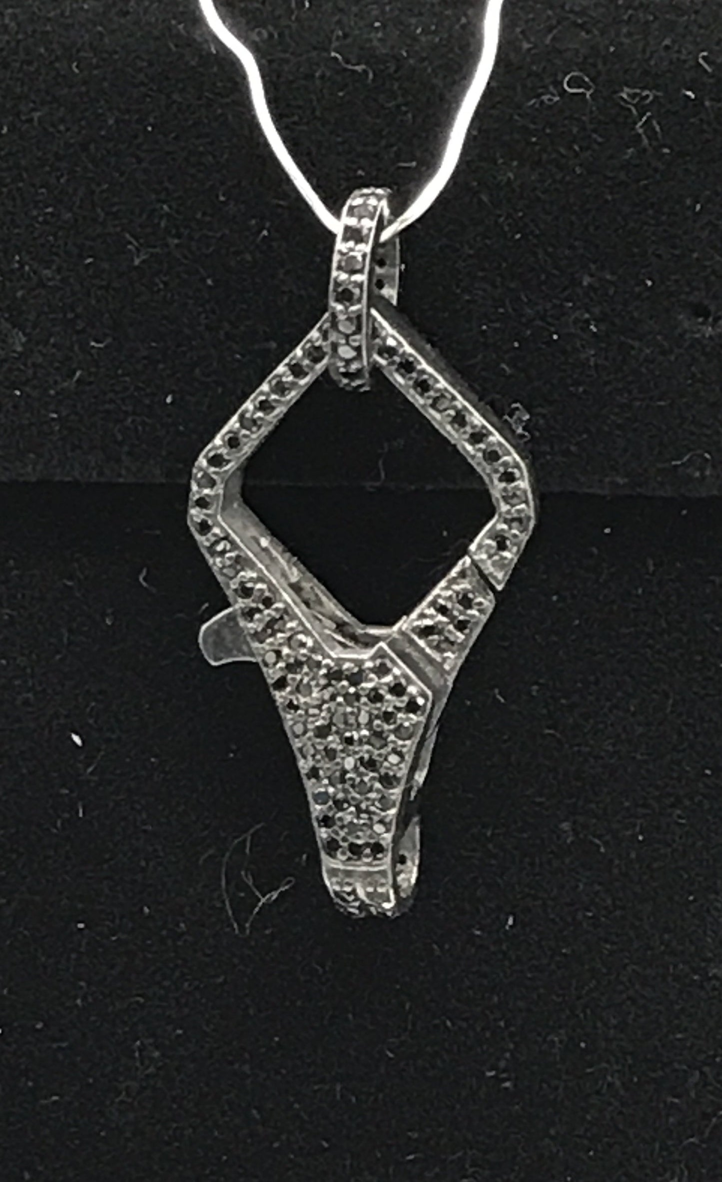 Black spinel clasps