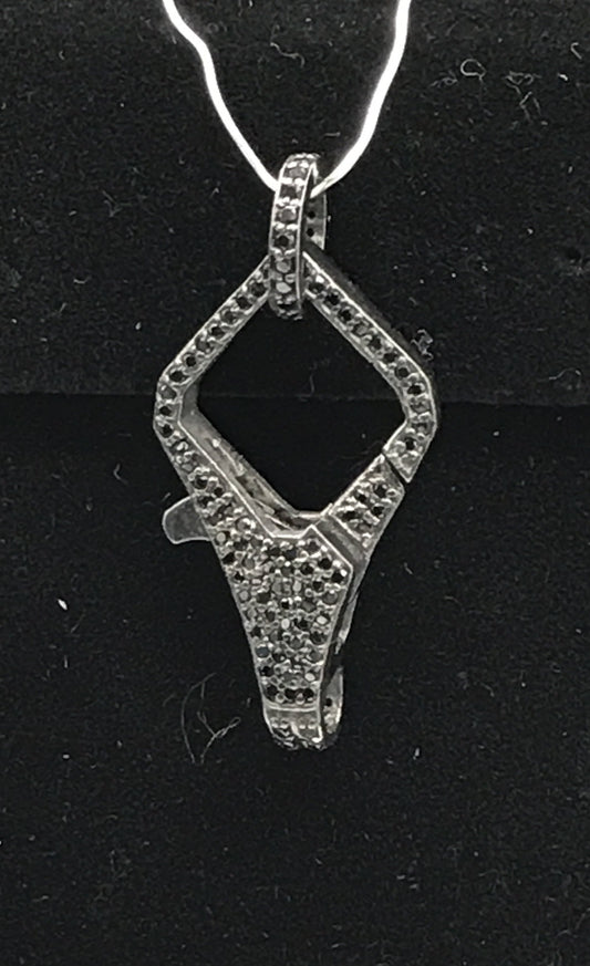 Black spinel clasps