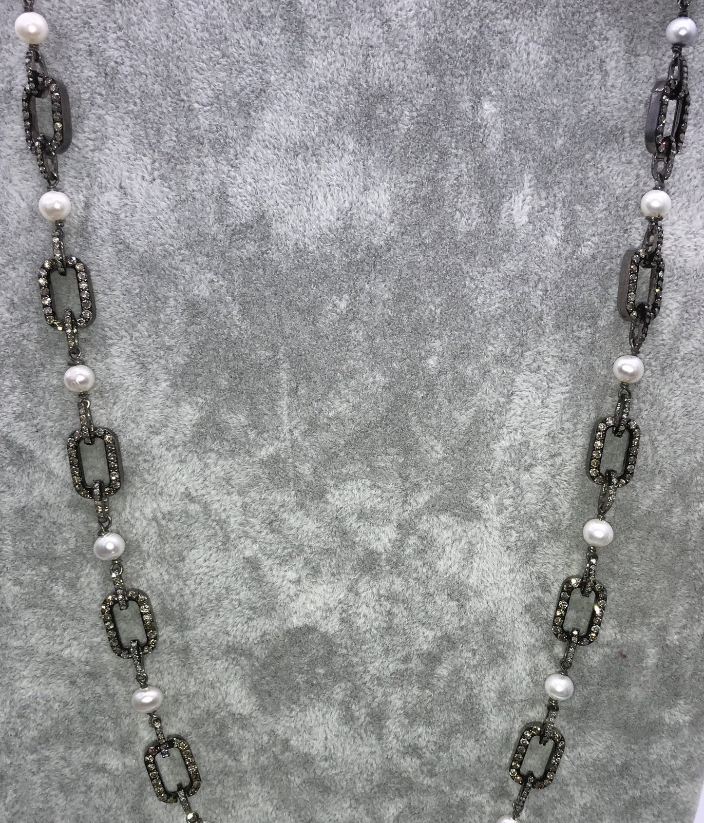 Pearl with diamond link chain