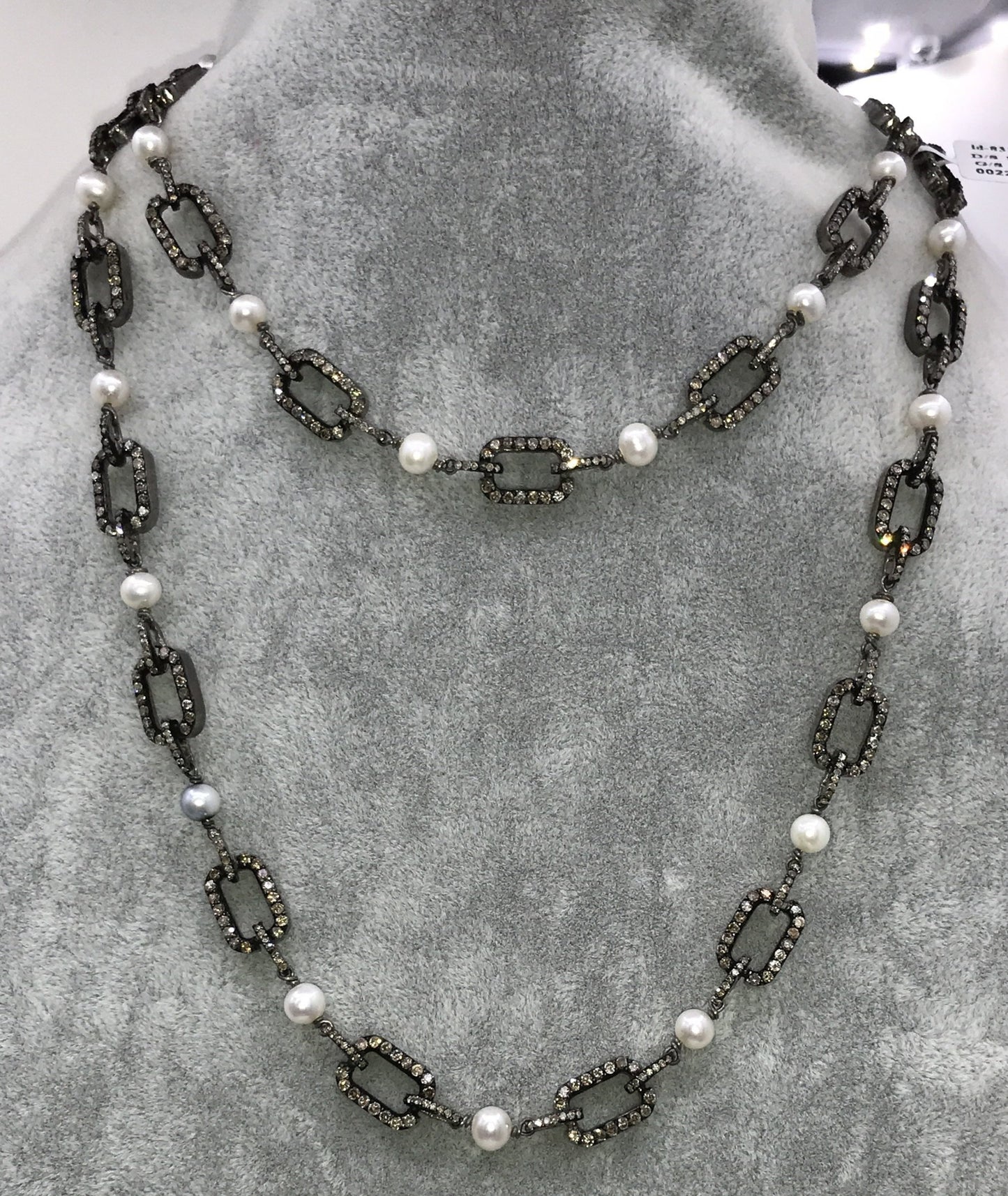 Pearl with diamond link chain